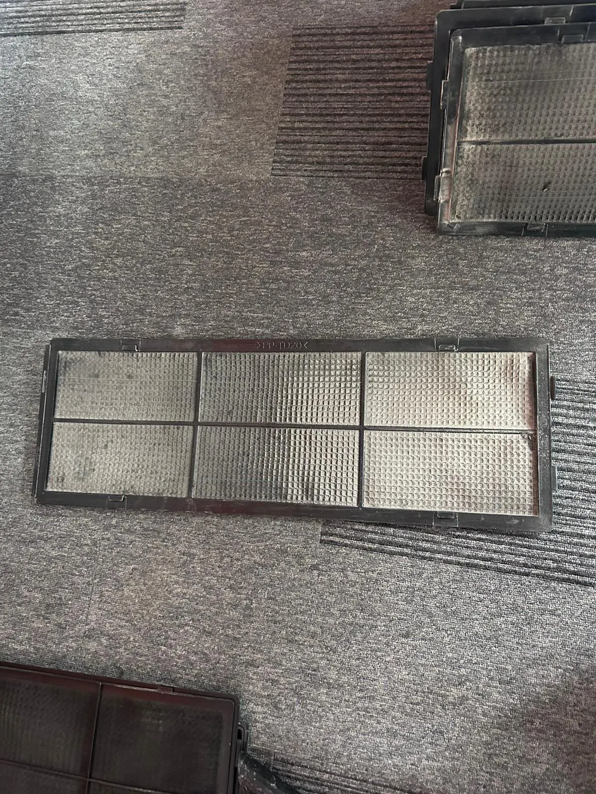 Air conditioning filter clogged with dust before cleaning